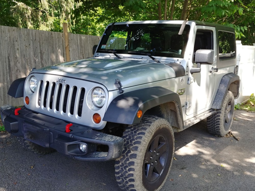 Windshield Replacement on a 2012 Jeep Wrangler - Titan Auto Glass